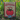 Box of Down to Earth All Purpose Tomato & Vegetable Mix fertilizer in a garden setting