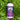 Neptune's Harvest Rose & Flowering fertilizer bottle on a bed of healthy green plants