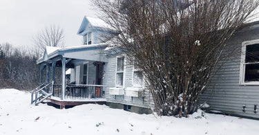 Pinetree Garden Seed's barn dusted in white Maine snow.