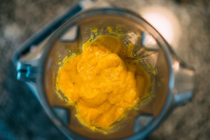 top view of pumpkin puree in blender