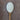 Finely ground garlic salt with light green parsley inclusions on a rustic wooden spoon.
